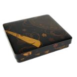 A JAPANESE LACQUERED AND DECORATED ARTIST/WRITING BOX The interior with copper ink kettle and bronze
