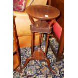 AN EARLY 20TH CENTURY MAHOGANY FOLDING CAKE STAND Along with a mahogany shaving stand. (79cm)