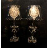 A PAIR OF TOLEWARE TABLE LAMPS AND SHADES Decorated in the classical style. (55cm) Condition: good