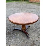 AN EARLY 19TH CENTURY CIRCULAR SNAP TOP BREAKFAST TABLE On hexagonal column, terminating on paw