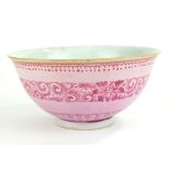 A CHINESE PINK ENAMEL AND PUCE PORCELAIN BOWL Hand painted with scroll band, bearing a blue square