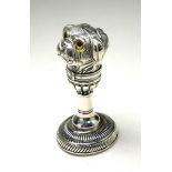 A SILVER PLATED 'PUG DOG' NOVELTY DESK SEAL Having a double head with glass eyes and embossed coat