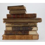 A PART SET OF 18TH/19TH CENTURY LEATHER BOUND BOOKS. Condition: varied