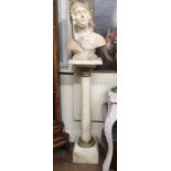 A 19TH CENTURY CARVED ALABASTER FEMALE PORTRAIT BUST Raised on onyx column. (bust 49cm, column