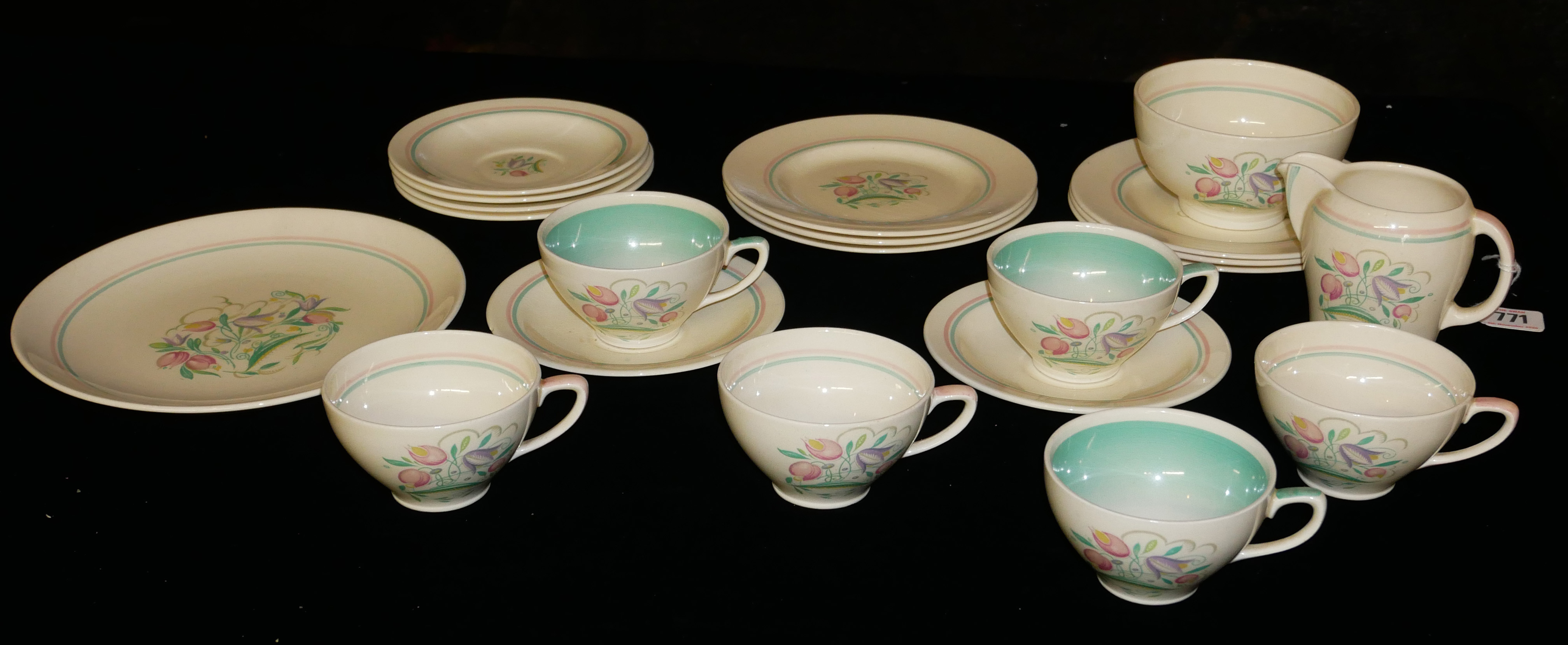 SUSIE COOPER, AN ART DECO POTTERY TEA SERVICE Comprising six cups and saucers, six side plates,