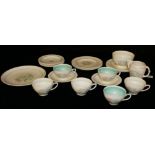SUSIE COOPER, AN ART DECO POTTERY TEA SERVICE Comprising six cups and saucers, six side plates,