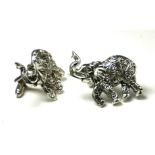A PAIR OF STERLING SILVER 'ELEPHANT' GENT'S CUFFLINKS Standing pose with engraved decoration. (