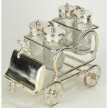 AFTER SAMPSON MORDAN, A SILVER PLATED NOVELTY CRUET SET IN THE FORM OF A CAR SET With four etched