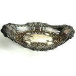 A VICTORIAN SILVER CAKE OVAL BASKET With scrolled edge and pierced decoration, hallmarked