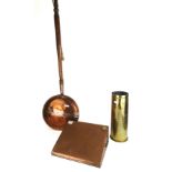 A 19TH CENTURY COPPER BED WARMING PAN Along with a copper foot warmer, a brass shell case,