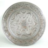 A LARGE PERSIAN WHITE METAL AND COPPER CHARGER PLATE Having scrolled and pierced decoration and