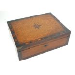 A VICTORIAN OAK WRITING SLOPE Having an inlaid star design to lid with geometric stringing to