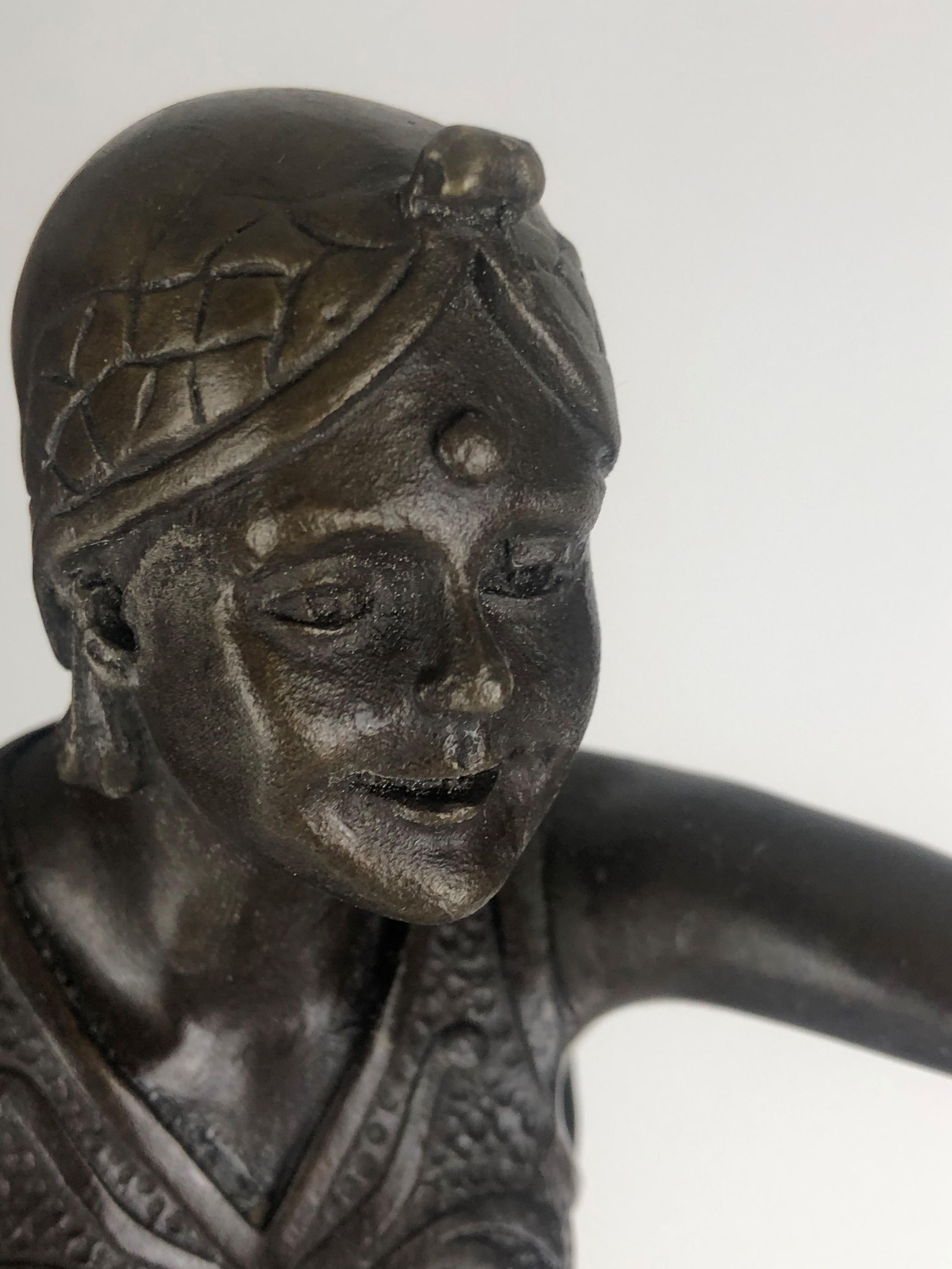 AN ART DECO STYLE BRONZE STATUE OF A SEMICLAD FEMALE DANCER On circular rouge and black marble base. - Image 2 of 3