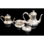 AN EARLY 20TH CENTURY MATCHED SILVER PLATED FOUR PIECE TEA AND COFFEE SERVICE Comprising a teapot,