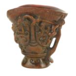 A CHINESE CARVED HORN LIBATION CUP. (14cm)