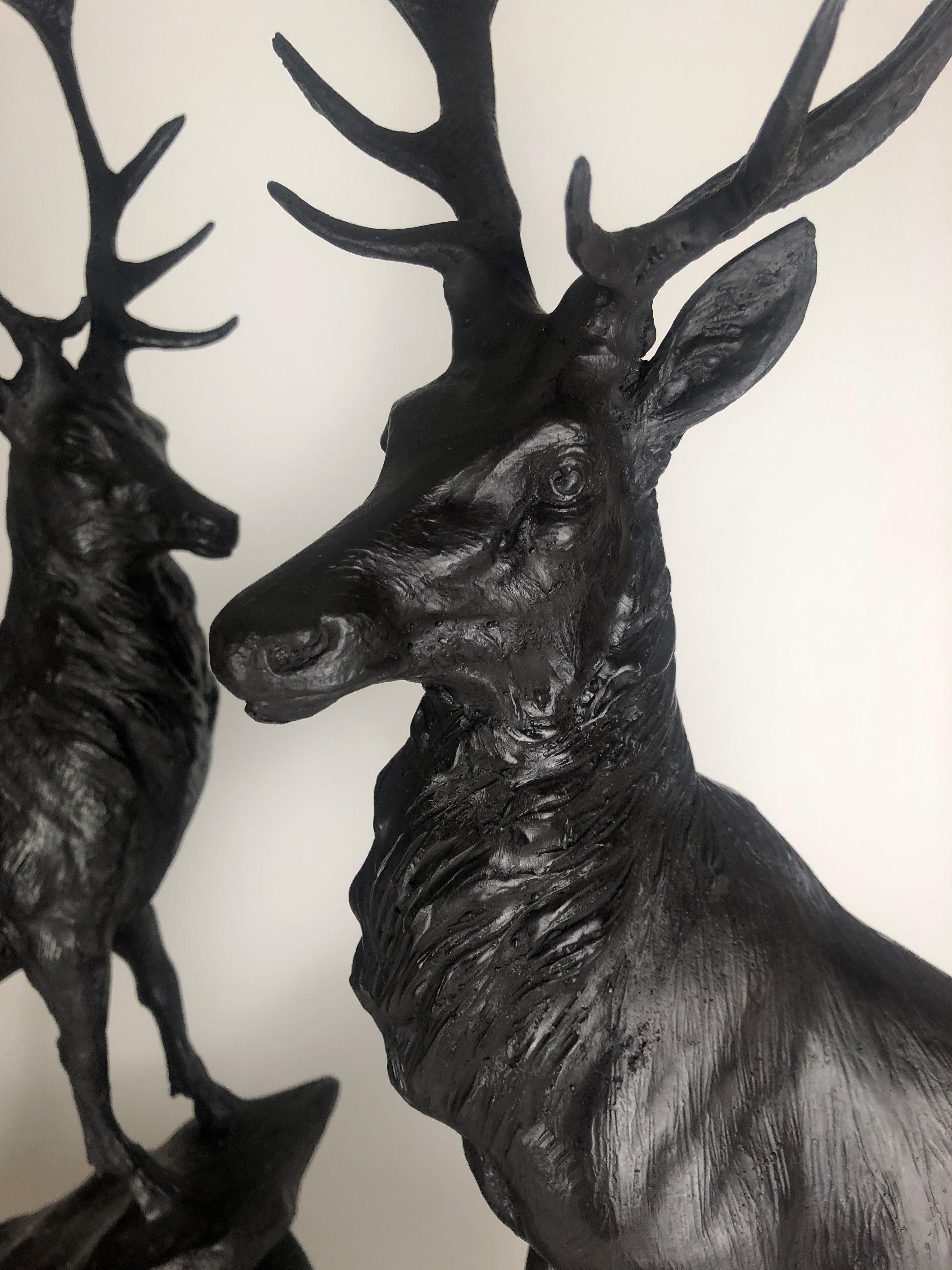 A PAIR OF BRONZE STATUES Royal stags, on black marble oval base. (74cm) Condition: good throughout - Image 2 of 3