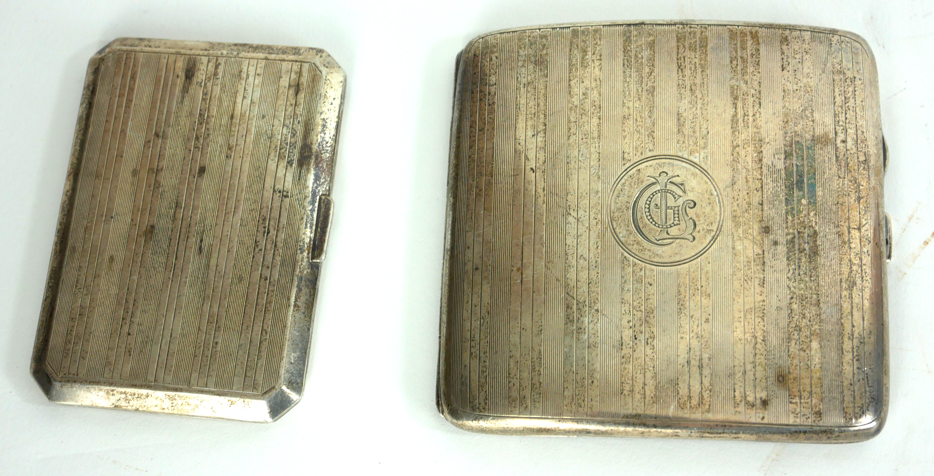 TWO EARLY 20TH CENTURY SILVER CIGARETTE CASE Having engine turned decoration, together with a silver