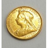 A QUEEN VICTORIA 22CT GOLD SOVEREIGN COIN, DATED 1900 With George and Dragon to reverse.