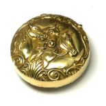 A BRASS 'EQUESTRIAN' NOVELTY VESTA CASE Embossed each side with three horse heads, hinged