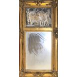 A CONTINENTAL GILT FRAMED MIRROR With faux marble relief playful putti amongst floral wreaths