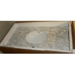A WHITE CERAMIC SINK AND MARBLE SURROUND Boxed as new. (90cm x 76cm)