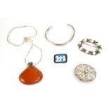 A COLLECTION OF VINTAGE SILVER JEWELLERY Comprising an amber necklace, Celtic form pierced brooch, a