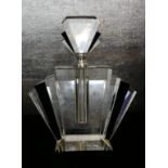 A LARGE ART DECO ODEON DESIGN CLEAR AND BLACK GLASS TABLE SCENT BOTTLE. (24cm) Condition: good