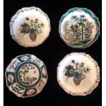 A SET OF FOUR 20TH CENTURY CHINESE PORCELAIN CARTOUCHE FORM BOWLS Brightly enamelled with flora