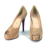CHRISTIAN LOUBOUTIN, A VINTAGE PAIR OF CORK DESIGN LEATHER HIGH HEEL LADIES' SHOES Having red soles,