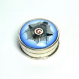 WITHDRAWN A SILVER AND ENAMEL MASONIC CIRCULAR PILL BOX With Masonic set square design to lid. (