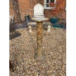 A 19TH CENTURY GREEN ONYX COLUMN The square top with canted corners, raised on ring turned