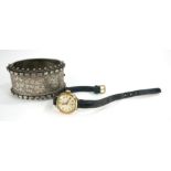 AVIA, A VINTAGE 9CT GOLD LADIES' COCKTAIL WATCH Having Arabic number markings and black leather