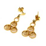 A PAIR OF CONTINENTAL YELLOW METAL EARRINGS Having concentric spiral design. (approx 2.5cm x 1.5cm)