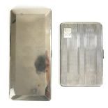 A LARGE MID 20TH CENTURY SILVER RECTANGULAR CIGARETTE CASE With engine turned decoration, interior