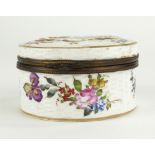 A 19TH CENTURY CONTINENTAL PORCELAIN TRINKET BOX Circular form with hand painted figural cartouche