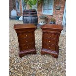 A PAIR OF MAHOGANY AND CEDAR WOOD LINED PEDESTAL BEDSIDE CABINETS Four graduated drawers. (45cm x