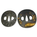 A LATE 18TH/EARLY 19TH CENTURY JAPANESE CAST IRON TSUBA Fine cast decoration of warriors and dragon,