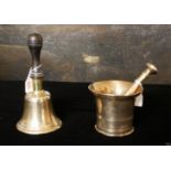 A VICTORIAN BRASS SCHOOL HAND BELL Having an ebonised wooden handle, together with a 19th Century