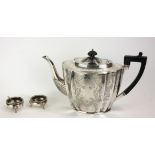 A VICTORIAN SILVER TEAPOT Having ebonised finial and handle, fluted body with engraved decoration,