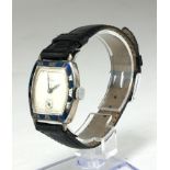 TIFFANY, A VINTAGE WHITE METAL AND BLUE ENAMEL WRISTWATCH Secondary dial, on a black leather faux