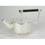 A SILVER PLATED ANGULAR SPHERICAL FORM TEAPOT With ebonised handle in the manner of Dr.