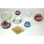 A COLLECTION OF SEVEN 20TH CENTURY GLASS PAPERWEIGHTS Including two Millefiori, by John Deacons