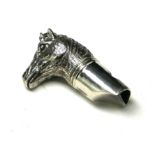 A STERLING SILVER 'EQUESTRIAN' NOVELTY WHISTLE With horse head and engraved decoration. (approx 4cm)