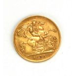 A KING EDWARD VII 22CT GOLD HALF SOVEREIGN COIN, DATED 1910 With George and Dragon to reverse.