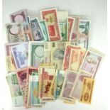 A COLLECTION OF WORLD BANK NOTES Including Bahrain and Jordan one Dinar, Mozambique 100 escudos,