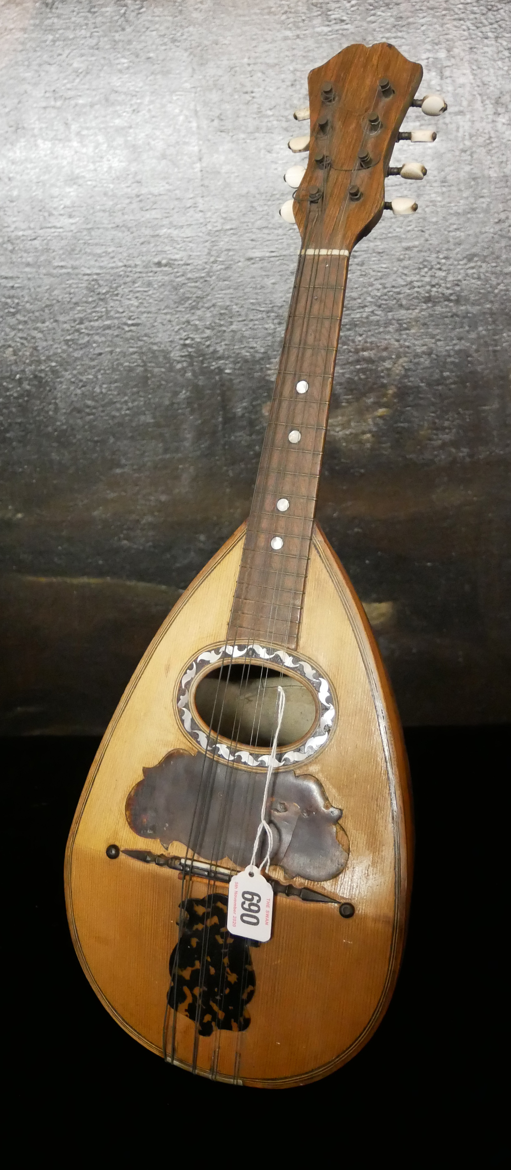 F.D. MUREDA, NAPOLI, A 19TH CENTURY ITALIAN ROSEWOOD AND TORTOISHELL MANDOLIN Having a dome form