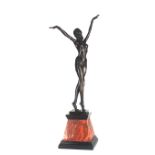 AN ART DECO STYLE BRONZE STATUE OF A SEMICLAD FEMALE With outstretched arms, on square tapering