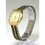 SEIKO, A VINTAGE YELLOW METAL AUTOMATIC WRISTWATCH Day date calendar window, on a bracelet strap. (