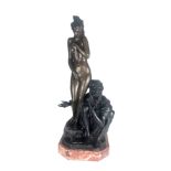 AN ART NOVEAU STYLE BRONZE STATUE OF A NUDE SLAVE GIRL WITH HER MASTER On rouge marble base. (
