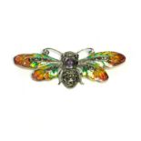 A SILVER MARCASITE PLIQUE-À-JOUR DESIGN INSECT BROOCH Butterfly with paste set wings. (approx 7.5cm)